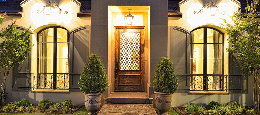 Arched Shutters Can Make Even The Plainest House Look Better